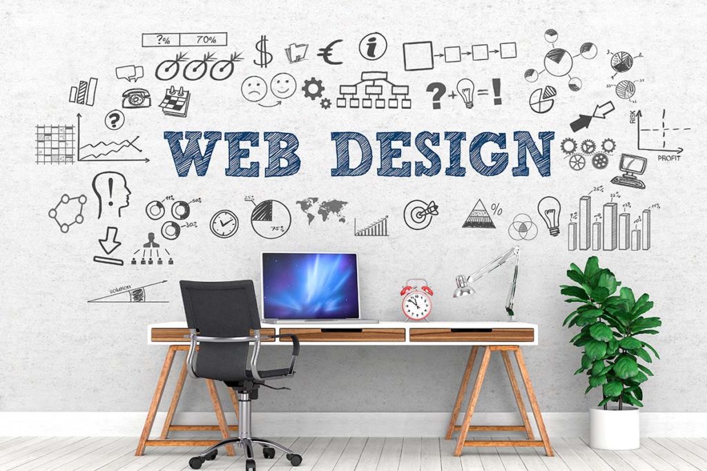 White wall with blue web design lettering and black animated marketing images with a wooden desk, chair, and computer